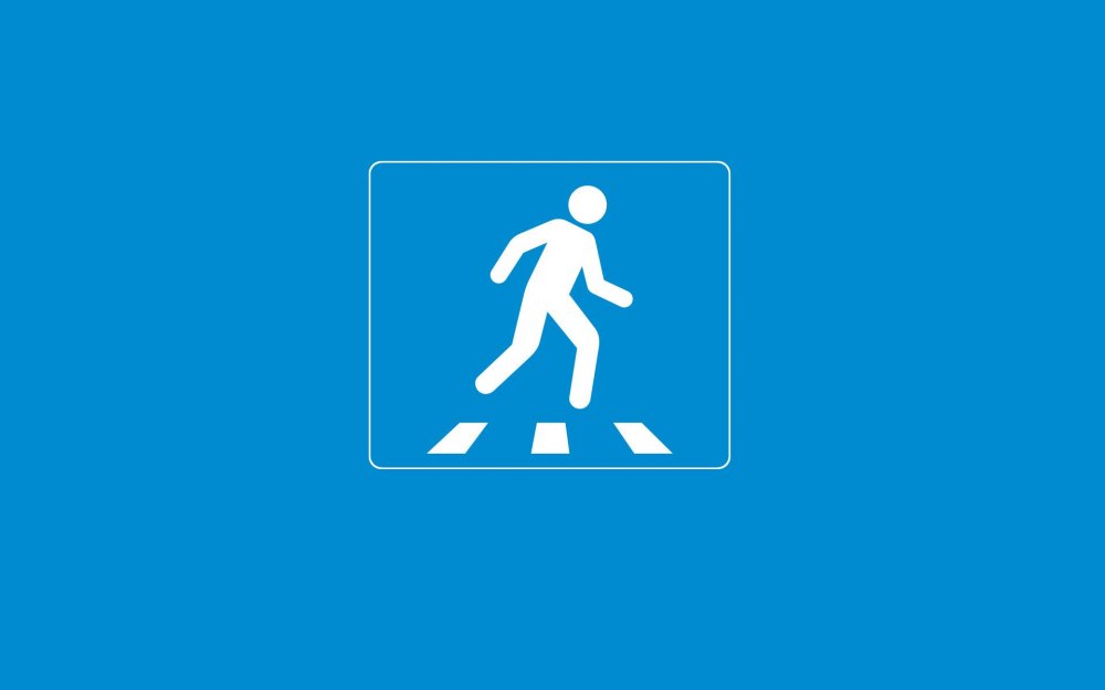 Знак пешехода на синем фоне