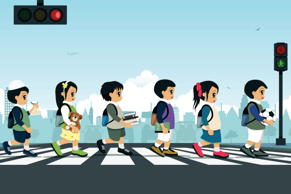 Дети идут по пешеходному переходу