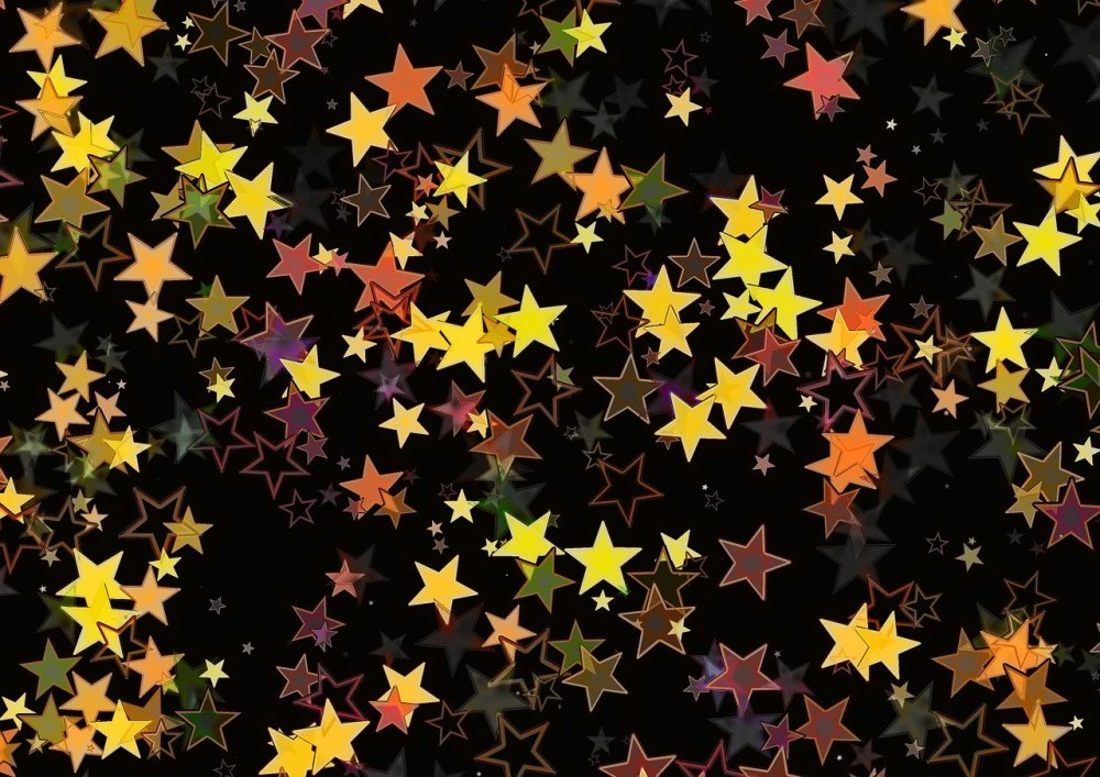 Разноцветные звезды на черном фоне