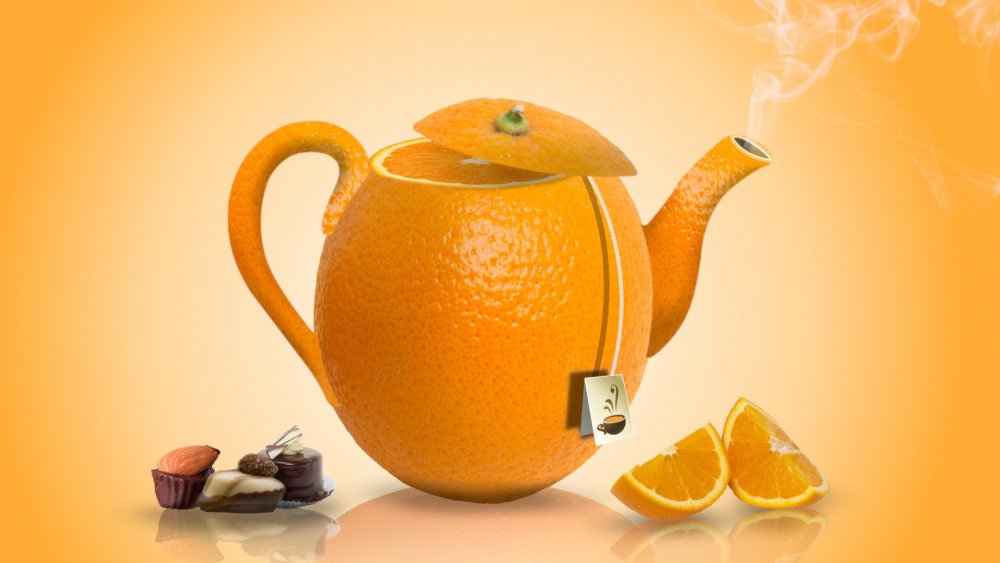 Чай с лимоном в чайнике