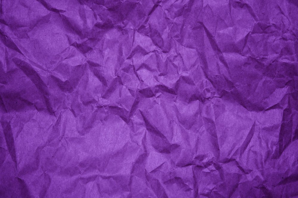 Фиолетовая мятая бумага