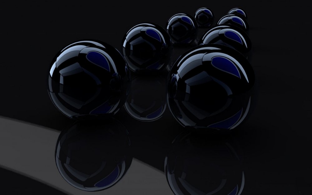Стеклянные шарики на темном фоне
