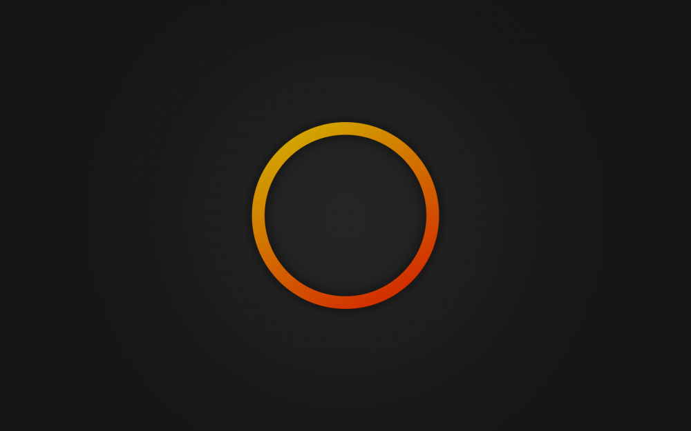 Оранжевый круг на черном фоне