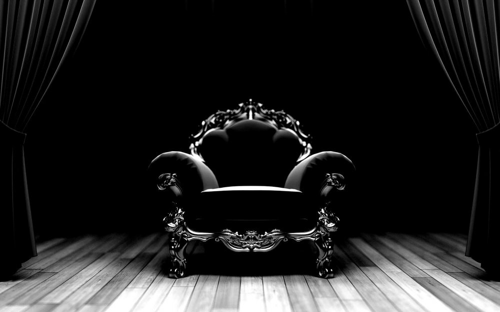 Кресло на черном фоне
