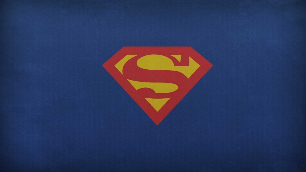Знак Супермена на синем фоне