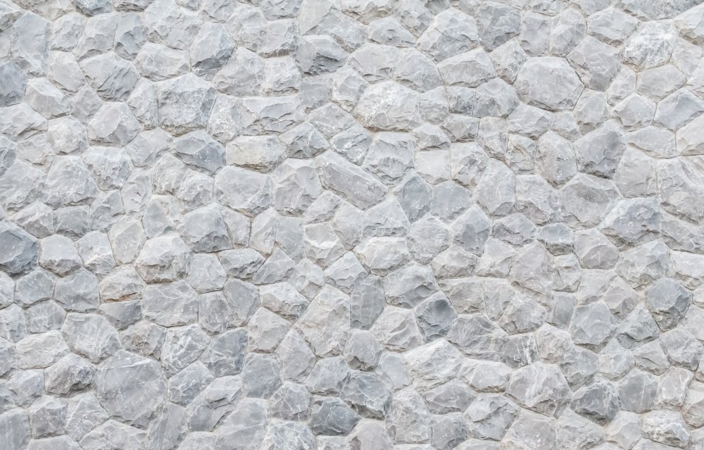 Белый камень стена