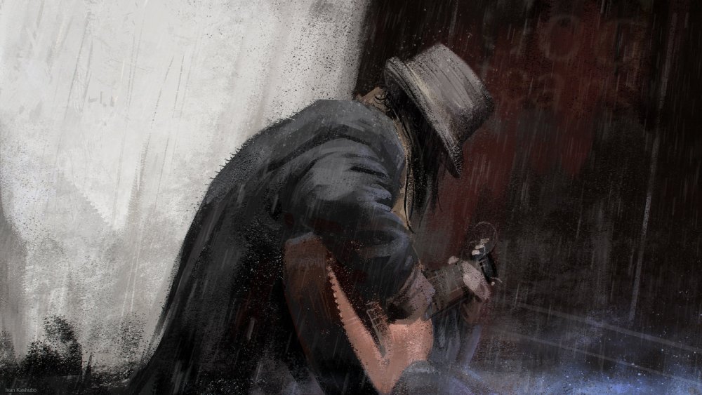 Человек в шляпе под дождем