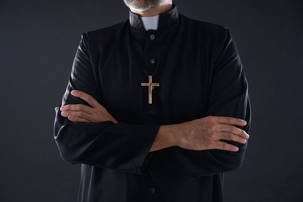 Священник католик