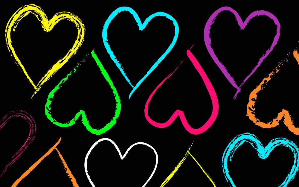 Разноцветные сердечки на черном фоне