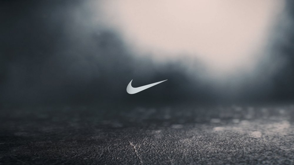 Nike логотип зеленый