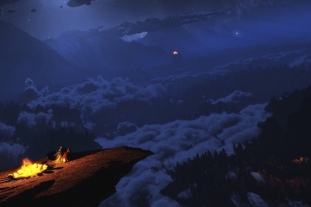 Костер в горах ночью